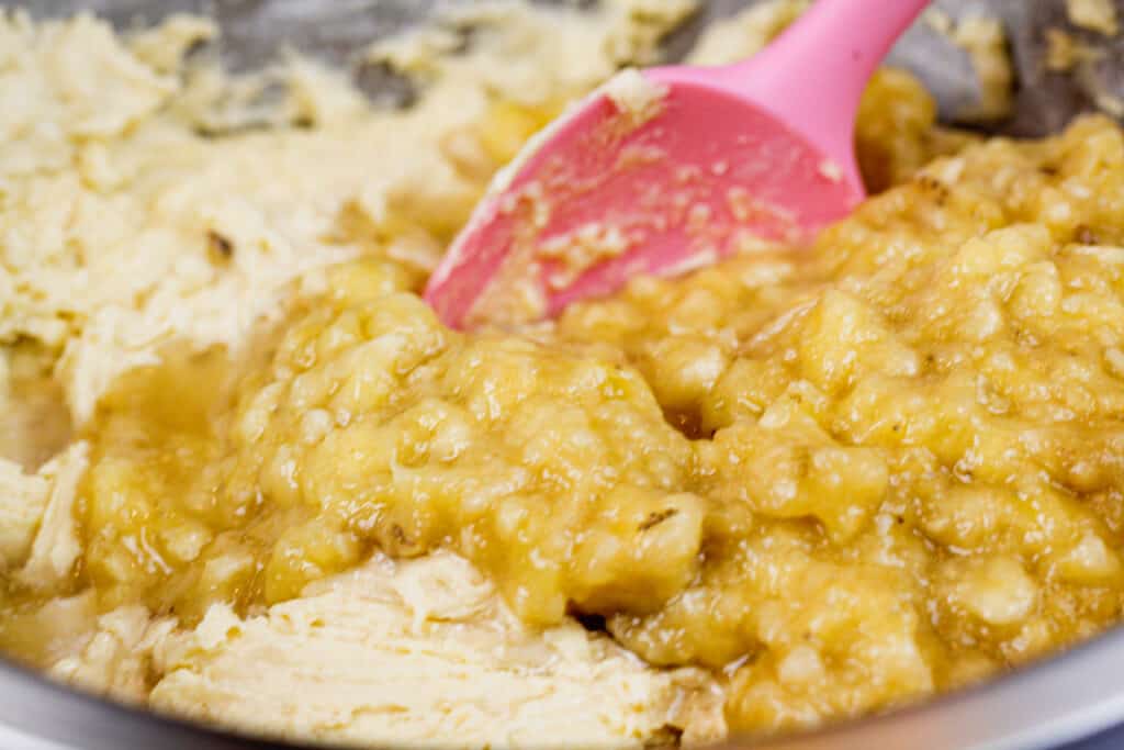 图像of banana bread batter being made with super ripe, brown bananas